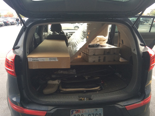 Ikea tetris... do you keep a single croc, a dog crate and a saddle rack in the back of your car?